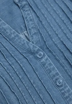 Farkkumekko kevyestä denimistä taskuilla