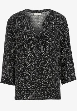 Jacquard-neuloksinen pusero