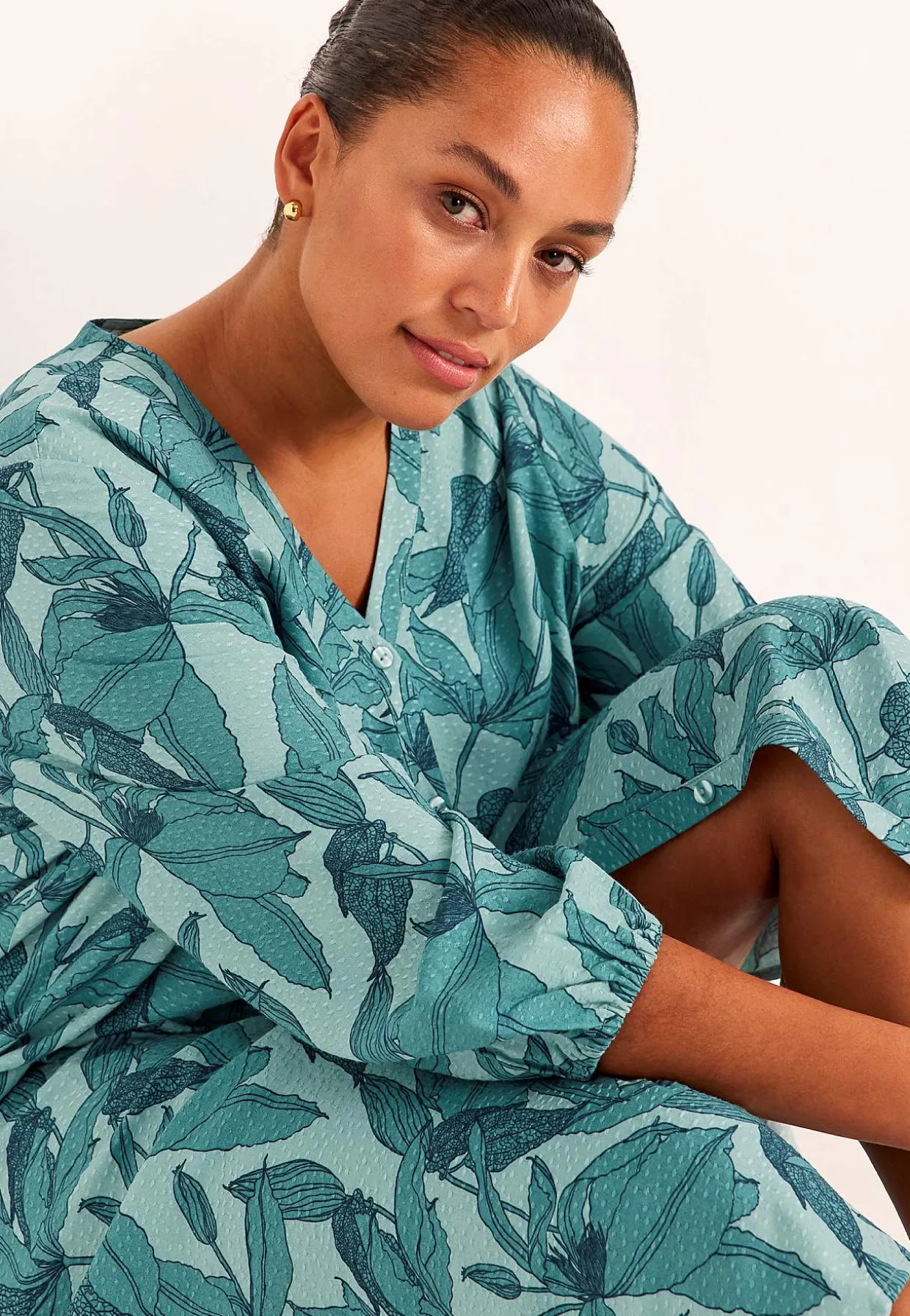 Kudottu mekko taskuilla