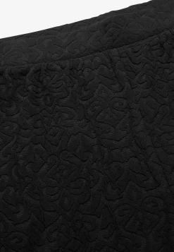 Leggingsit rakennekuviolla