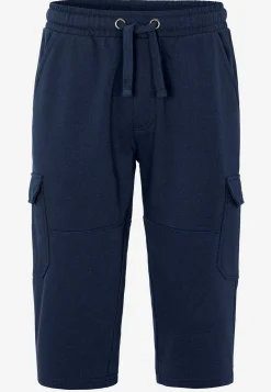 Pitkät verryttelyshortsit reisitaskuilla