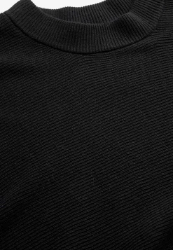 Tiheäsilmukkainen poncho