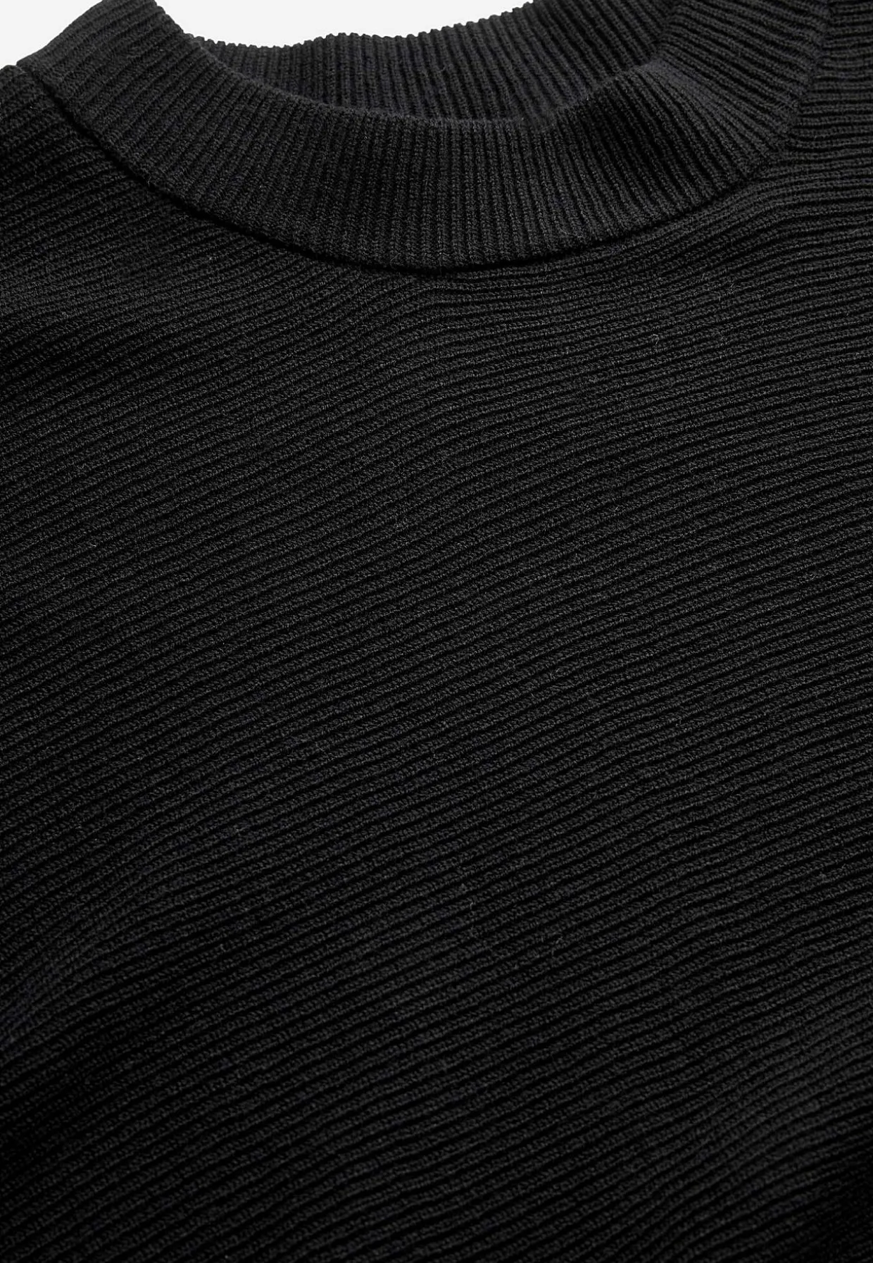 Tiheäsilmukkainen poncho
