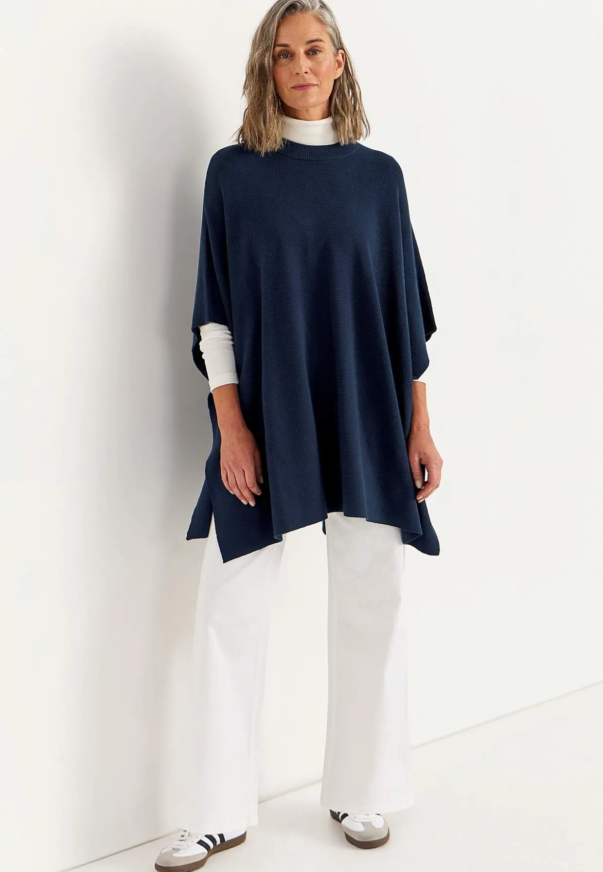 Tiheäsilmukkainen poncho