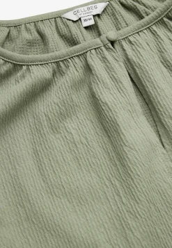 Toppi rypytetystä puuvillajersey-kankaasta