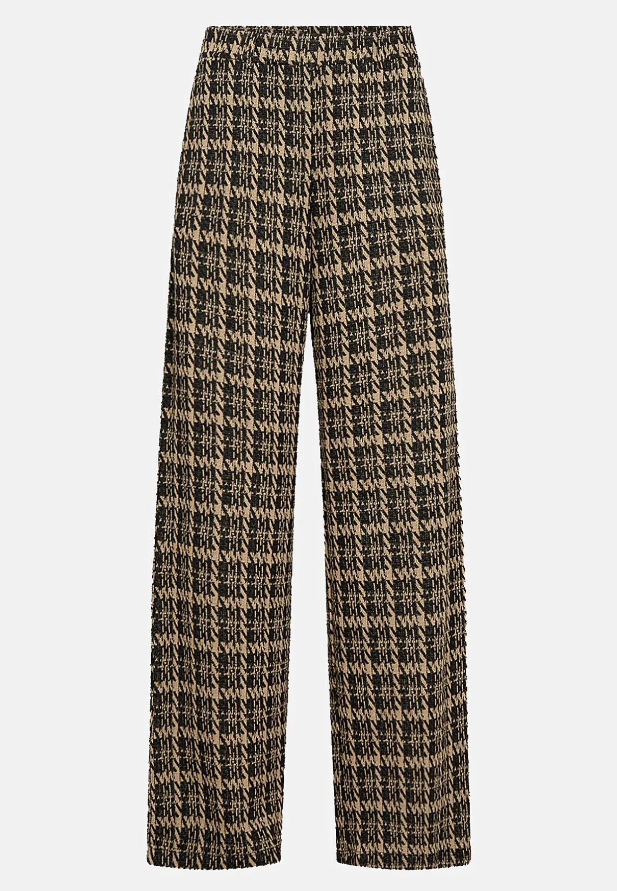 Trikoohousut taskuilla